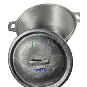 Cast aluminium sufuria size 2 angled open view showing loop handles and thick cast walls, handmade Kenya