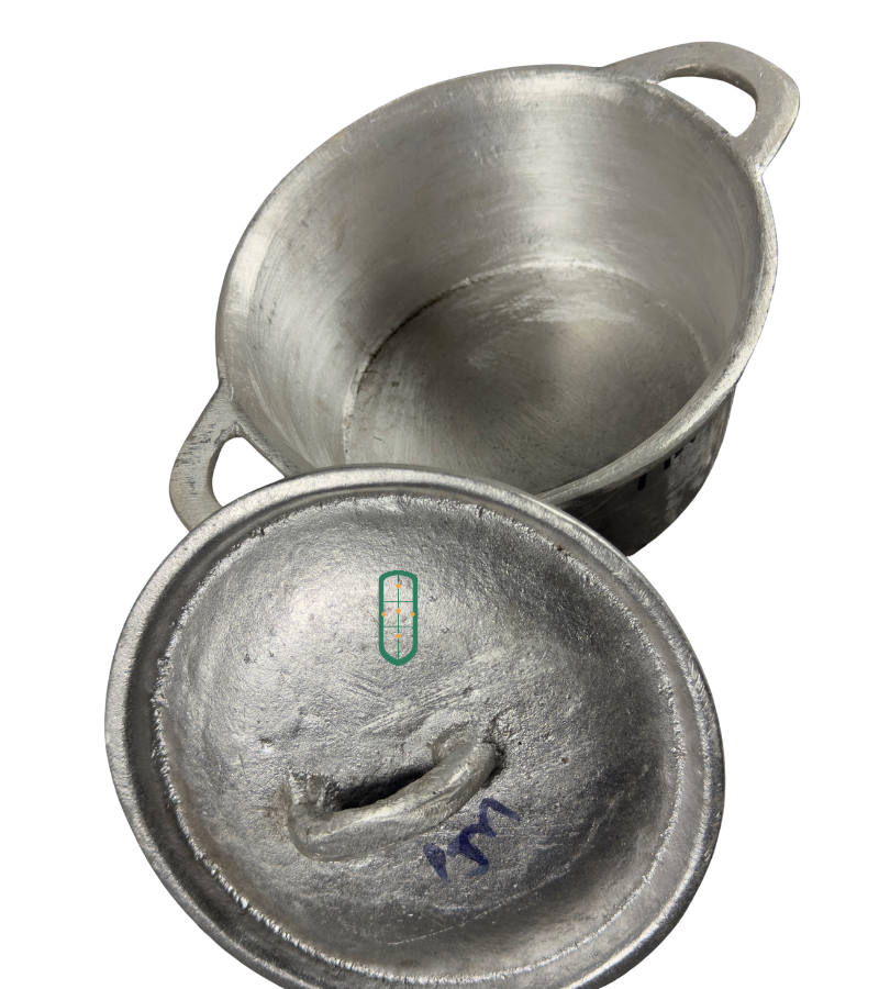 Cast aluminium sufuria size 1 open top view showing thick cast interior and fitted domed lid, Juakali Kenya