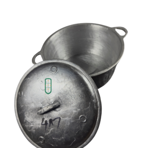 Cast aluminium sufuria size 4 open top view showing wide deep interior and heavy domed lid, Juakali Kenya