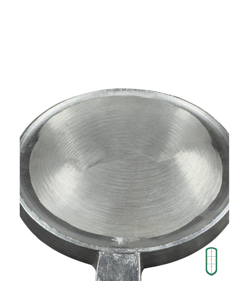Aluminium chapati pan light underside view showing smooth spun surface and wire handle, Juakali Kenya