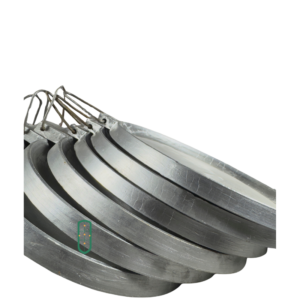 Aluminium chapati pans stacked side view showing multiple sizes, Juakali Kenya