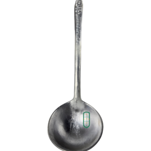 Small cast aluminium serving spoon full length view showing long handle and round bowl, Juakali Kenya