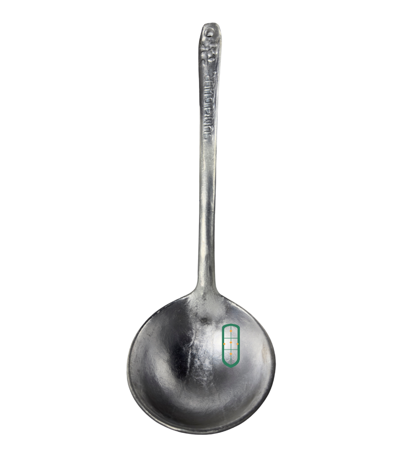 Small cast aluminium serving spoon full length view showing long handle and round bowl, Juakali Kenya