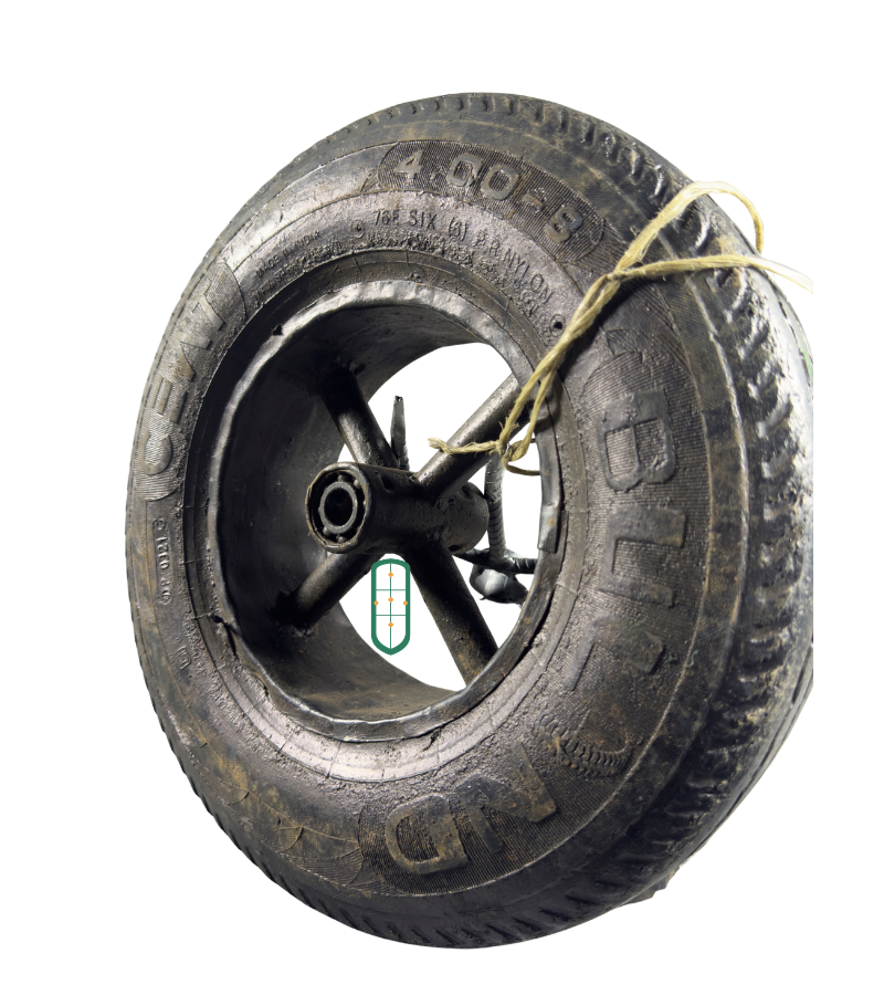 Wheelbarrow wheel angled view showing full tyre profile and spoke rim construction, Kenya
